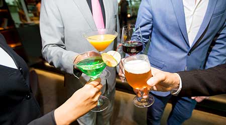 People Clinking Glasses of Alcoholic Drinks