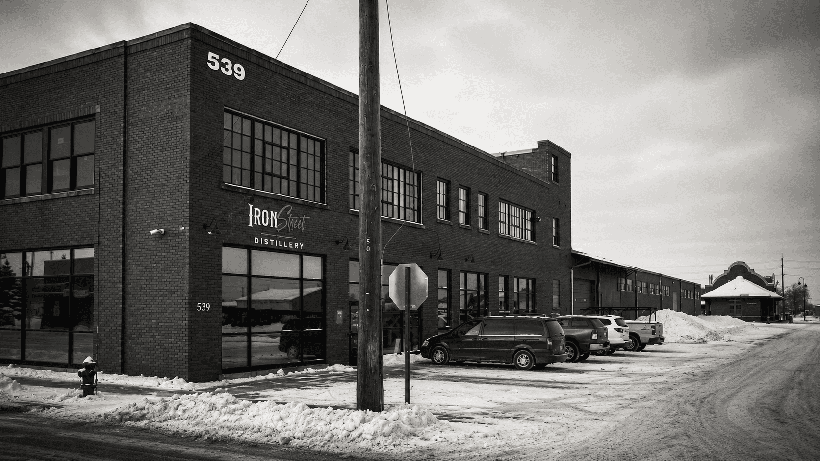 Welcome sign at Iron Street Distillery event