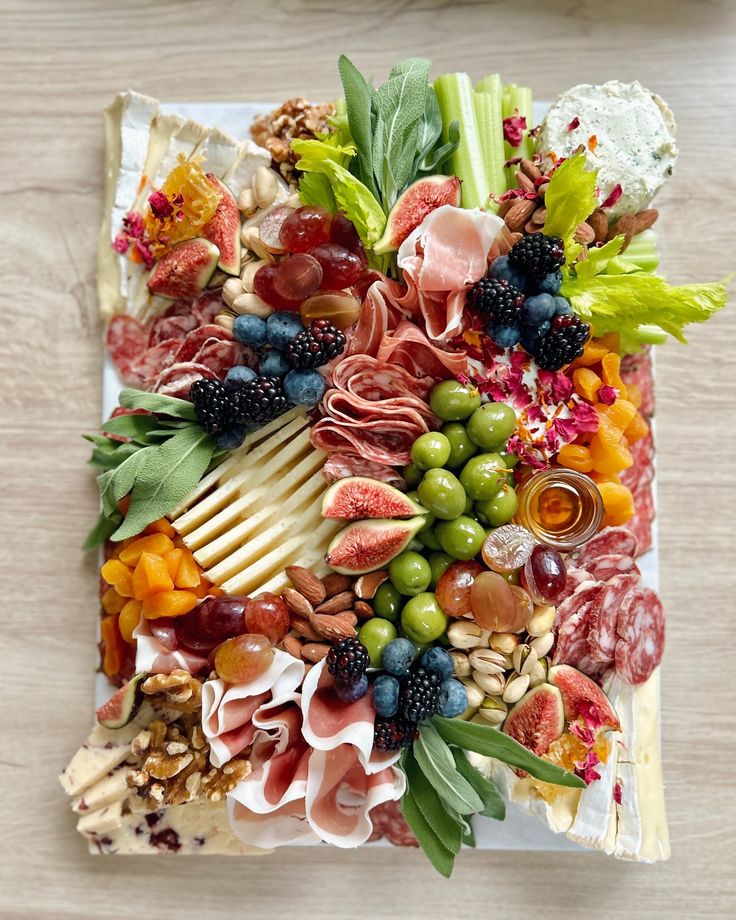 Charcuterie board with meats and cheeses